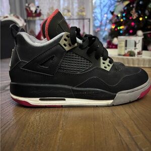 Black and Red retro Jordan 4s
